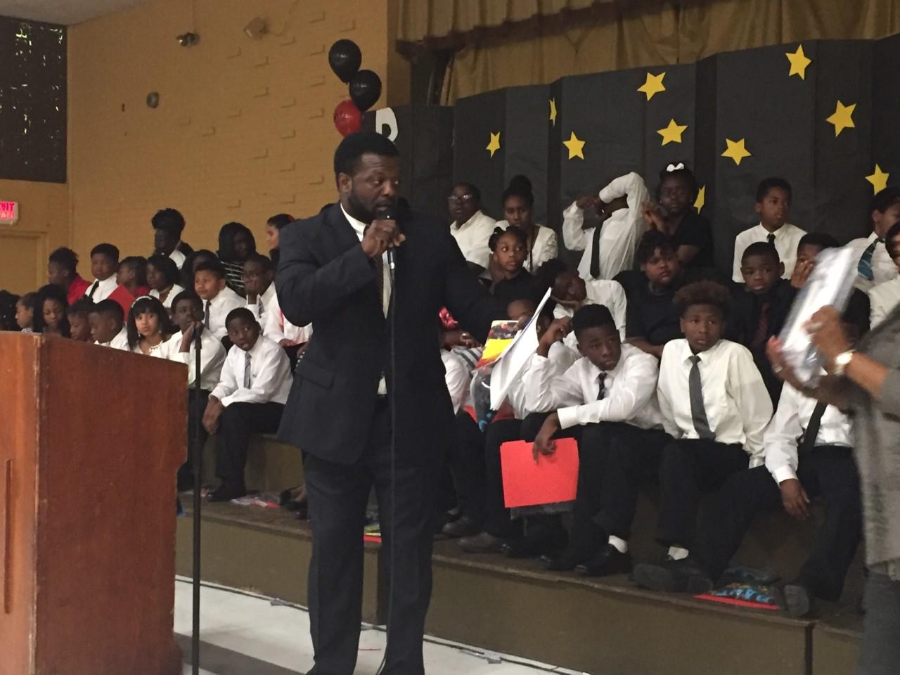 Another photo of Baker Middle Principal Roy Walker encouraging and welcoming graduating fifth graders from Bakerfield and Baker Heights