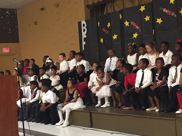 Photo of Bakerfield and Baker Heights Kindergarten students on stage for their awards and graduation program