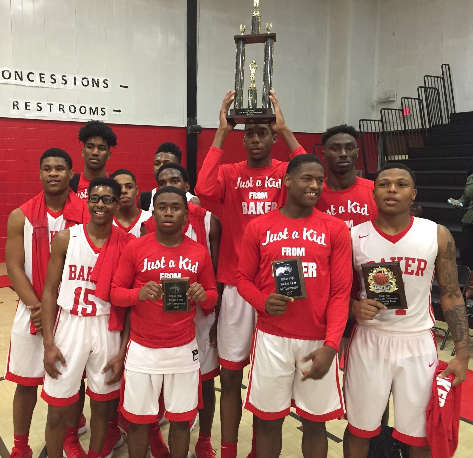 Photo of the Baker High Boys Basketball team after winning the Wedge Keyes Tournament