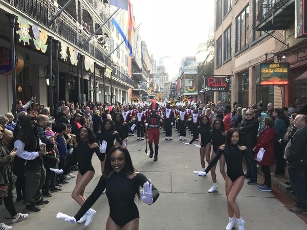 Photo of the Baker High School Band leading at the Krewe of Cork Parade in New Orleans