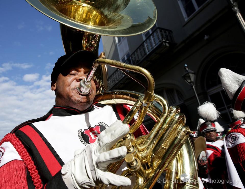 Photo of Baker High School player on Tuba at the Krewe of Cork Parade in New Orleans 