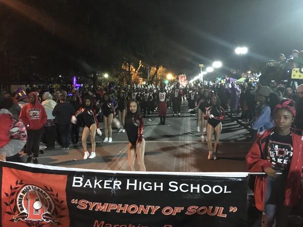 Photo of the Baker High School Band marching in the Knights of Chaos Parade on February 8, 2018