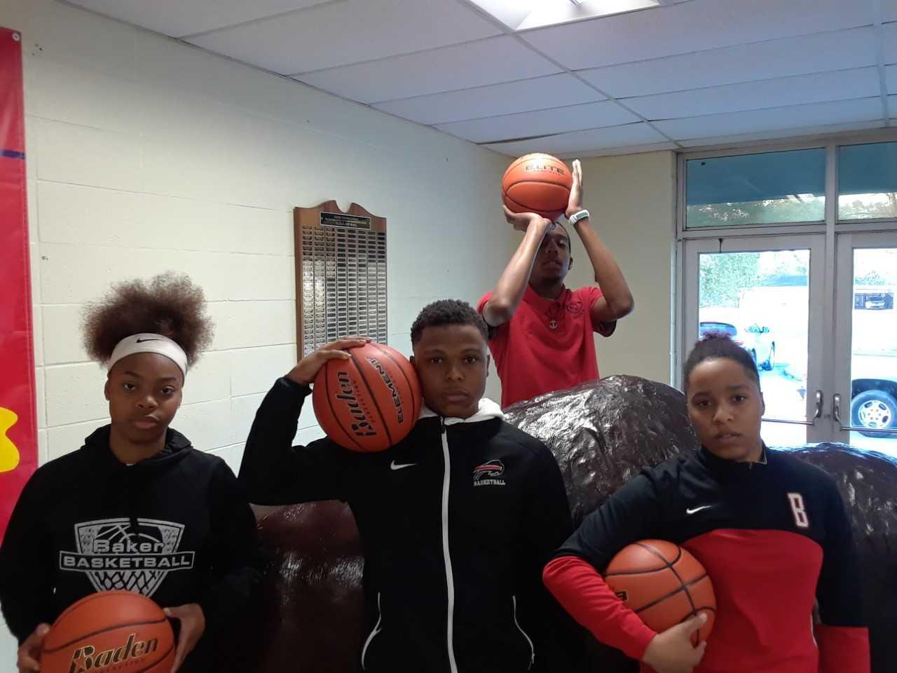 A photo of the 4 basketball athletes from Baker High who will participate in the Louisiana NAACP EBR All Star Game