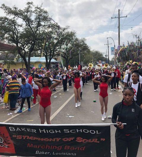  a photo of The Baker High School Symphony of Soul in the Krewe of Tucks parade coming down historic St. Charles Ave.